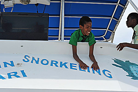 dominica,roseau,schoolchildren,excited,in,the,boat,during,unicef,-,environmental,network,whalewatching