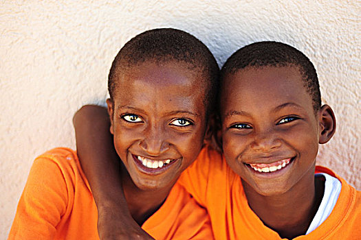 haiti,port,au,prince,two,boy,hugging