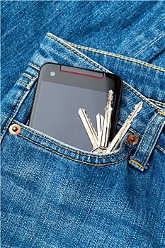 蓝色牛仔裤,口袋,手机,门钥匙