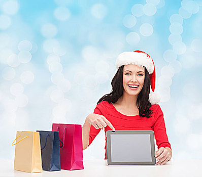 圣诞节,休假,科技,广告,人,概念,微笑,女人,圣诞老人,帽子,购物袋,平板电脑,电脑,上方,蓝色,背景