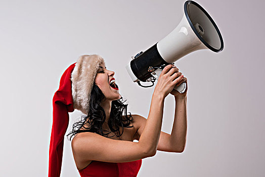 圣诞节,女人,扩音器,白色背景,戴着,圣诞老人,红色,帽子,连衣裙