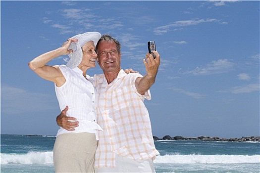 夫妻,照相,海滩,手机,微笑,仰视