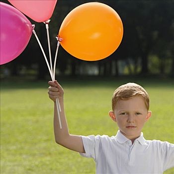 肖像,男孩,拿着,气球,公园