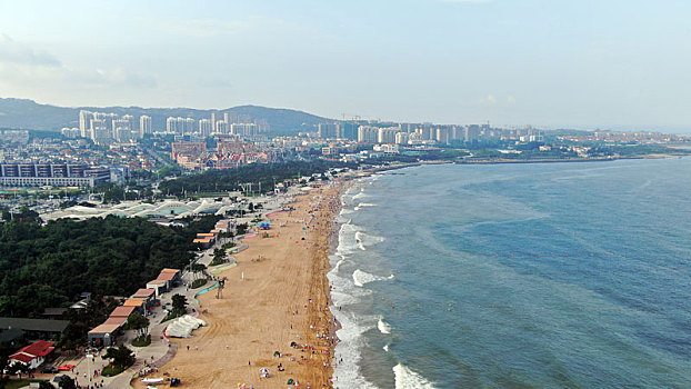 山东省日照市,海水浴场开启下饺子模式,海滨旅游迎来旺季