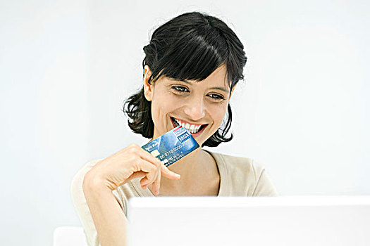 女人,咬,边缘,信用卡,微笑,笔记本电脑
