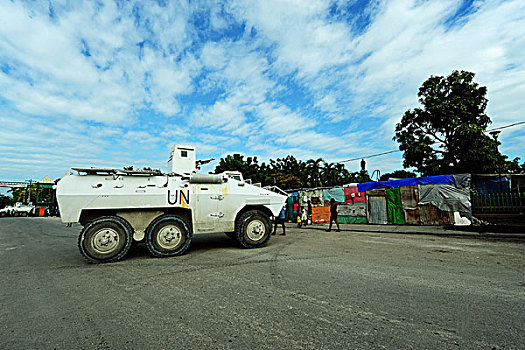 haiti,port,au,prince,un,tank,in,front,of,refugee,camp