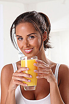 运动,女人,拿着,玻璃杯,橙汁