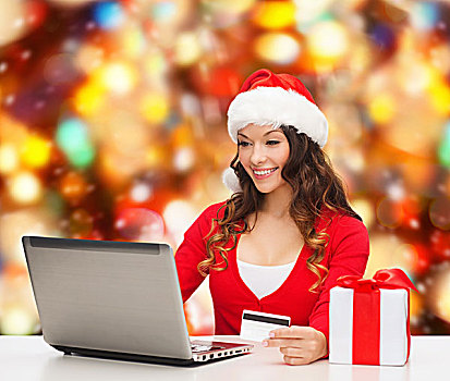圣诞节,休假,科技,购物,概念,微笑,女人,圣诞老人,帽子,礼盒,信用卡,笔记本电脑,上方,红灯,背景