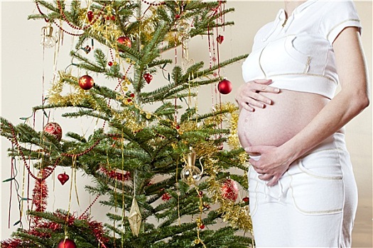 特写,孕妇,站立,圣诞树