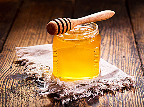 罐,蜂蜜,木桌子