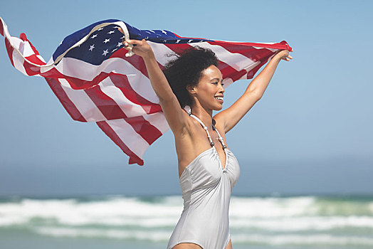 女人,拿着,美国国旗,海滩