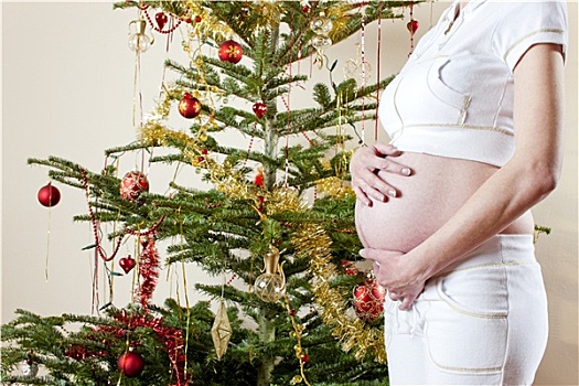 特写,孕妇,站立,圣诞树