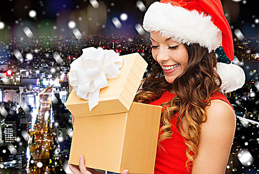 圣诞节,冬天,高兴,休假,人,微笑,女人,圣诞老人,帽子,礼盒,上方,雪,夜晚,城市,背景