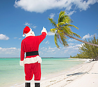 圣诞节,休假,人,概念,男人,服饰,圣诞老人,指向,背影,上方,热带沙滩,背景