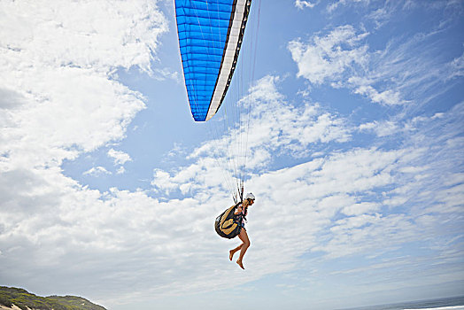 女性,滑翔伞,滑伞运动,晴朗,蓝天