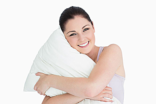 微笑,女人,拿着,枕头,手臂,白色背景