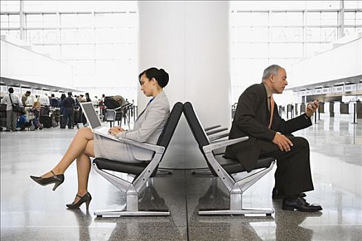 侧面,职业女性,笔记本电脑,商务人士,手机,机场