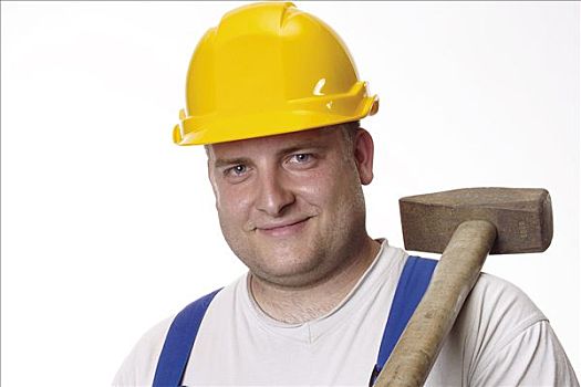 建筑工人,穿,黄色,安全帽,拿着,锤子,上方