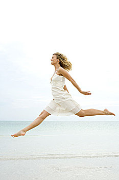 女人,跳跃,空中,海滩,侧面视角