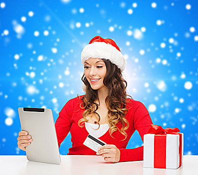 圣诞节,休假,科技,购物,概念,微笑,女人,圣诞老人,帽子,信用卡,平板电脑,电脑,上方,蓝色,雪,背景
