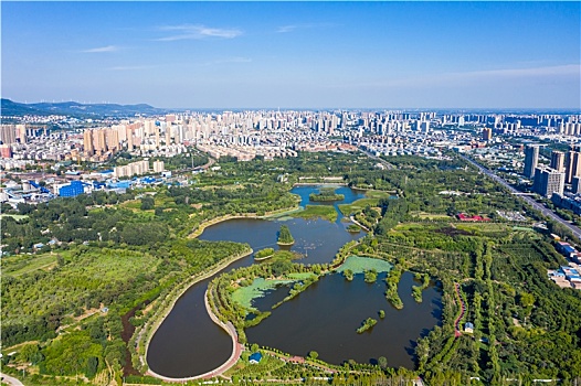 航拍河南平顶山白鹭洲国家城市湿地公园,采煤塌陷地湿地环境改造出的城市休闲公园