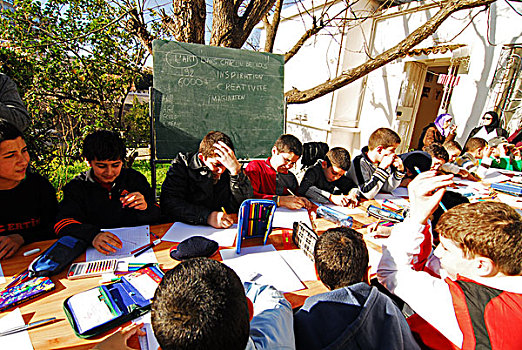 algeria,alger,portrait,of,a,group,school,children,preparing,sketch,on,drawing,paper