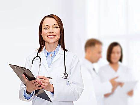 医药健康,概念,微笑,女医生,写字板,听诊器