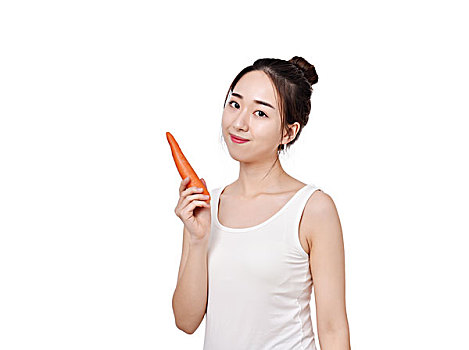 健康饮食,女性拿着一颗胡萝卜