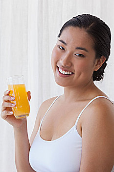 漂亮,亚洲女性,拿着,玻璃,橙汁