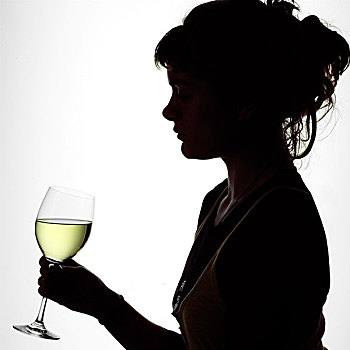 剪影,一个年轻女子的肖像,享受,一杯白葡萄酒