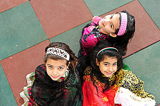 kuwait,city,high,angle,portrait,of,3,schoolgirls
