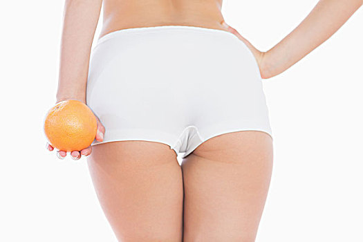 后视图,女人,短裤,拿着,橙色,上方,白色背景