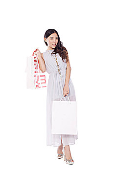 young,woman,carrying,shopping,bags