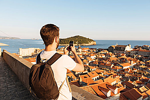 男人,摄影,海洋,上方,屋顶,杜布罗夫尼克,克罗地亚,欧洲
