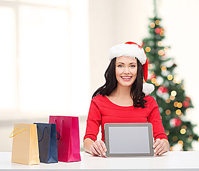 圣诞节,圣诞,电子产品,小物件,概念,微笑,女人,圣诞老人,帽子,留白,显示屏,平板电脑,购物袋