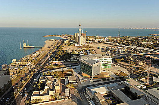kuwait,city,coastline,and,skyline,with,the,towers
