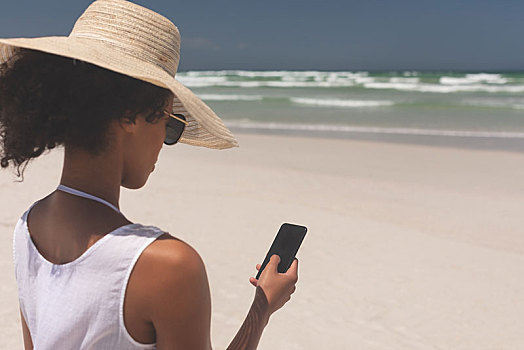 美女,帽子,打手机,海滩