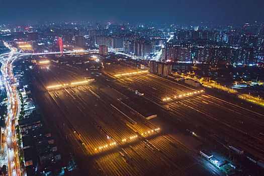 航拍河南郑州北站铁路编组站编组场货物列车夜景