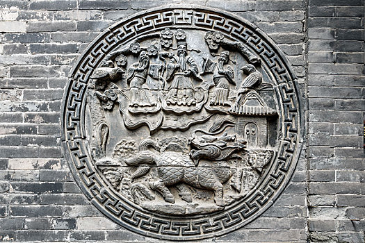 中国山西省平遥古城晋商马家大院砖雕照壁