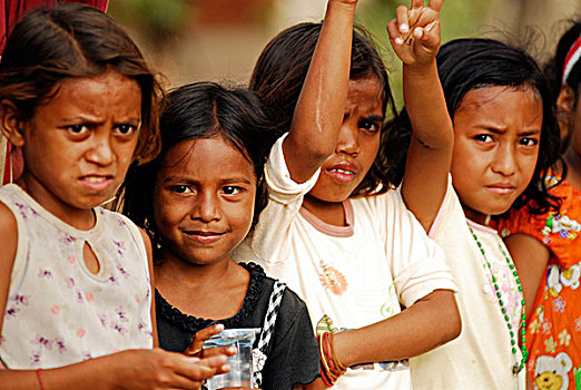 east-timor,timor-leste,dili,portrait,of,smiling,timorese,adolescent,with,black,tshirt