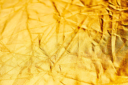 金色的有褶皱的反光布