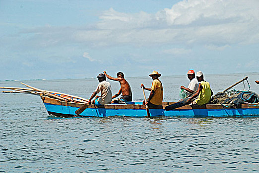 brazil,pernambuco,ilha,de,itamaraca,adults,going,fishing,on,small,boat