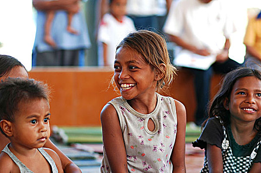 east-timor,timor-leste,dili,profile,of,timorese,girl,drinking,water