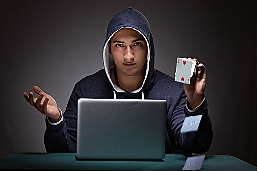 男青年,穿,帽衫,坐,正面,笔记本电脑,赌博
