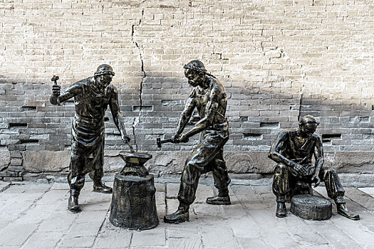 中国山西省晋城郭峪古城街头市井民俗雕塑
