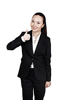 年轻的商务女士竖起大拇指