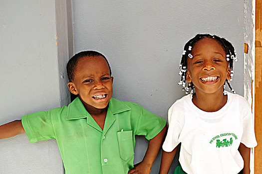 dominica,roseau,preschool,social,center,portrait,of,young,girl,and,boy