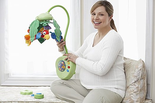 孕妇,婴儿玩具