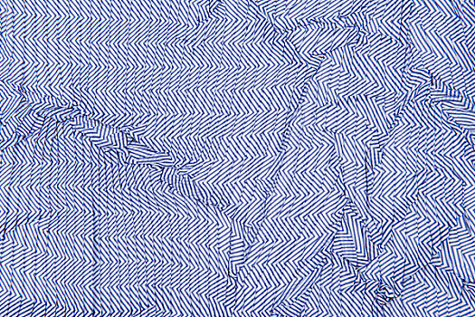 浅蓝色褶皱条纹布料背景