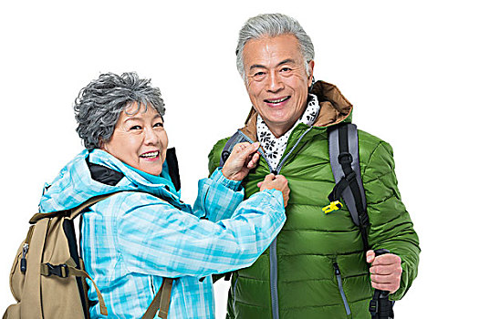 老年夫妇冬季登山旅行